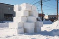 snow blocks stacked for sculpture base