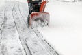Snow blower - the best helper for snow removal in winter Royalty Free Stock Photo