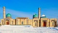 Snow and blue domes and minarets of Hazrati Imam complex, religious center of Tashkent