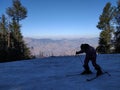A snow boarder on the mountain. Adventure sports in winter season.