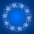 Snow border circle frame. Christmas texture, isolated on blue background. Snowflake abstract effect. Holiday border Royalty Free Stock Photo