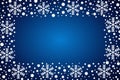 Snow border frost frame. Christmas texture, isolated on blue background. Snowflake abstract effect. Holiday border Royalty Free Stock Photo