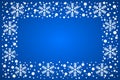 Snow border frost frame. Christmas texture, isolated on blue background. Snowflake abstract effect. Holiday border Royalty Free Stock Photo