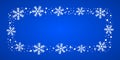 Snow border frost frame. Christmas texture, isolated on blue background. Snowflake abstract effect. Holiday border Royalty Free Stock Photo