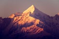 A snow capped Himalayn mountain at dusk Royalty Free Stock Photo