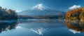 A snow-capped mountain reflected in a crystal-clear lake Royalty Free Stock Photo
