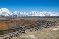 Gorgeous winter landscape of the Teton mountains in the background and a split rail fence in the foreground. Royalty Free Stock Photo