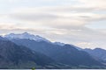 Snow-capped mountains on the banks of Hawea lake. New Zealand Royalty Free Stock Photo