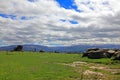 Snow capped mountains and boulders Royalty Free Stock Photo