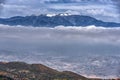 Snow capped Mountains with Cloud Bank