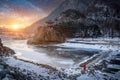 Snow-capped mountains and frozen rivers on a clear day in winter in sunset, South Korea Royalty Free Stock Photo