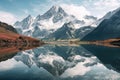 snow-capped mountains mirrored in a glassy alpine lake