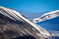 Snow capped mountains surround Longyearbyen, Norway Royalty Free Stock Photo