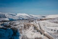 Snow-capped mountains under the bright sun