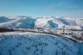 Snow-capped mountains under the bright sun