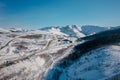 Snow-capped mountains under the bright sun