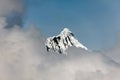 Peak of Kawagarbo or Kawa Karpo emerge from the clouds Royalty Free Stock Photo