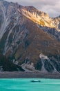 Snow-capped peaks over the lake. Mountains and lakes of the South Island. Tasman Glacial Lake. New Zealand Royalty Free Stock Photo