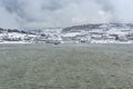 The snow-capped shores of Lake Ram, located in the northeastern part of the Golan Heights in Israel Royalty Free Stock Photo