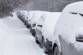 Snow on cars after snowfall. Winter time. Royalty Free Stock Photo