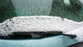 Snow on cars after snowfall. Winter urban scene. rear window Royalty Free Stock Photo