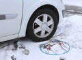 Snow chains in the car tyre in winter Royalty Free Stock Photo