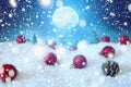 Snow christmas magic lights background. Christmas card with a winter forest and christmas decorations in a moonlit night. The elem Royalty Free Stock Photo