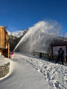 Snow cleaning with a large snow blower in the high tatras Slovakia Royalty Free Stock Photo
