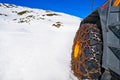 Snow clearing excavator in Aran Valley