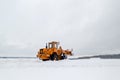 Snow clearing. Tractor clears the way after heavy snowfall Royalty Free Stock Photo