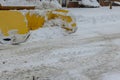 Snow clearing tractor clears the way after heavy snowfall