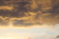 snow cloud painted in gold color of the setting of the spring sun