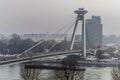 Snow and cold fog on the new bridge in Bratislava