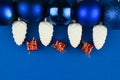 Snow cones with christmas balls on blue background