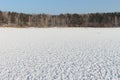 Snow cover of a freakish form on ice of the frozen river