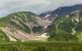 Snow cover on mountains of Vilyuchinsky pass in the summer. Royalty Free Stock Photo