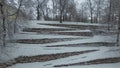 Snow-covered English stairs in the PuÃâawy park, aerial view