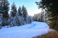 SNow covered beautiful old American rustic country side landscape with bridge, trail and water canal. Peaceful and inspiring Royalty Free Stock Photo