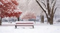 A snow covered bench in a city park Royalty Free Stock Photo