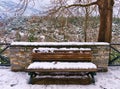 Snow covered  bench in Litohoro, Pieria Greece Royalty Free Stock Photo