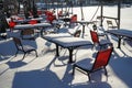Snow-covered benches. Winter village Royalty Free Stock Photo