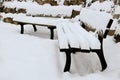Snow-covered benches: Winter in southern Germany Royalty Free Stock Photo