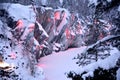 Snow-covered canyon with forest lighting, winter landscape