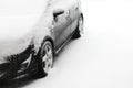 Snow covered car
