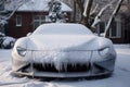 snow-covered car hood with warming engine beneath Royalty Free Stock Photo