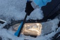 Snow covered car lights