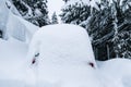 Snow covered car