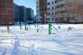 Snow-covered children`s and sports grounds in Russia. Poor cleaning of snow. Inaction of public services