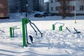 Snow-covered children`s and sports grounds in Russia. Poor cleaning of snow. Inaction of public services