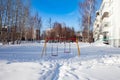 Snow-covered children`s and sports grounds in Russia. Poor cleaning of snow. Inaction of public services.